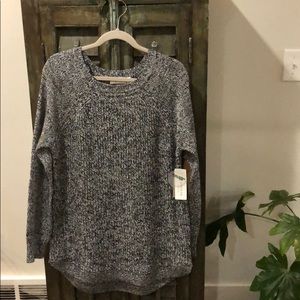 Soft knit sweater with stylish leather elbow patch